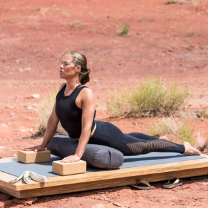 Woman doing hard exercise using Cork Block in Salt Lake City, UT | Santosh Yoga Institute