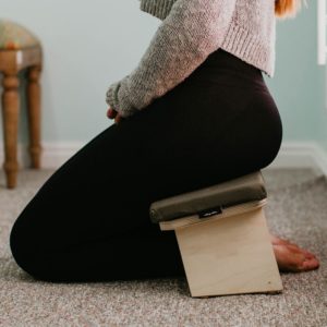 Woman sitting on Meditation Bench in Salt Lake City, UT | Santosh Yoga Institute