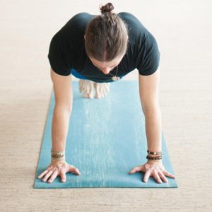 Woman Doing Yoga Using Para Rubber Yoga Mat in Salt Lake City, UT | Santosh Yoga Institute
