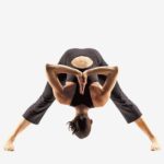 Woman doing yoga wearing T-Back Capri Yogatard in Salt Lake City, UT | Santosh Yoga Institute